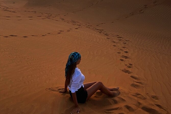 Dubai Desert Safari: Tanoura Show, Dune Bashing and BBQ Dinner - From Dubai towers to open dunes