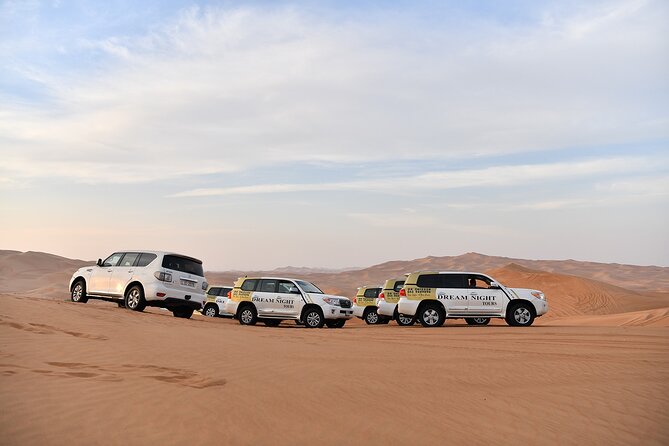 Dubai Desert Safari With Dune Bashing, Camel Ride & BBQ Dinner - Camel ride, henna, coffee, and dates at camp