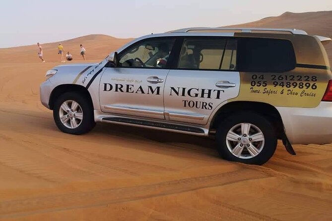 Dubai Desert Safari With Dune Bashing, Camel Ride & BBQ Dinner - Belly dance, tanoura, and fire performances