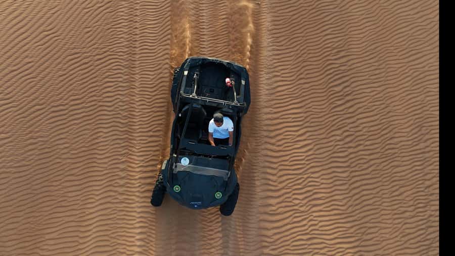 Dubai: Dune Buggy Safari and Camel Ride with Transportation - One hour of dunes, rock formations, and photo stops