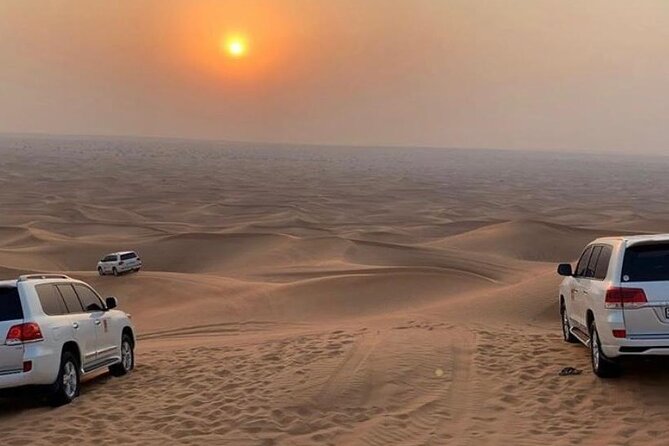 Dubai Dunes Safari With Quad Bike, Camel Ride, BBQ Dinner & Live Shows - Sandboarding, camel riding, and sunset photos