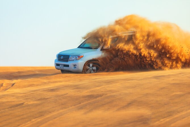 Dubai Evening Desert Safari With Transfers Dune Bashing & Dinner - From Dubai hotel pickup to Lahbabs golden dunes