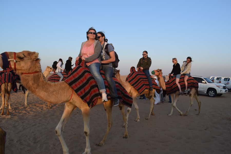 Dubai: Evening Tour with Quad Biking, Camel Ride, and BBQ - Red dunes, red sand, and a full evening out