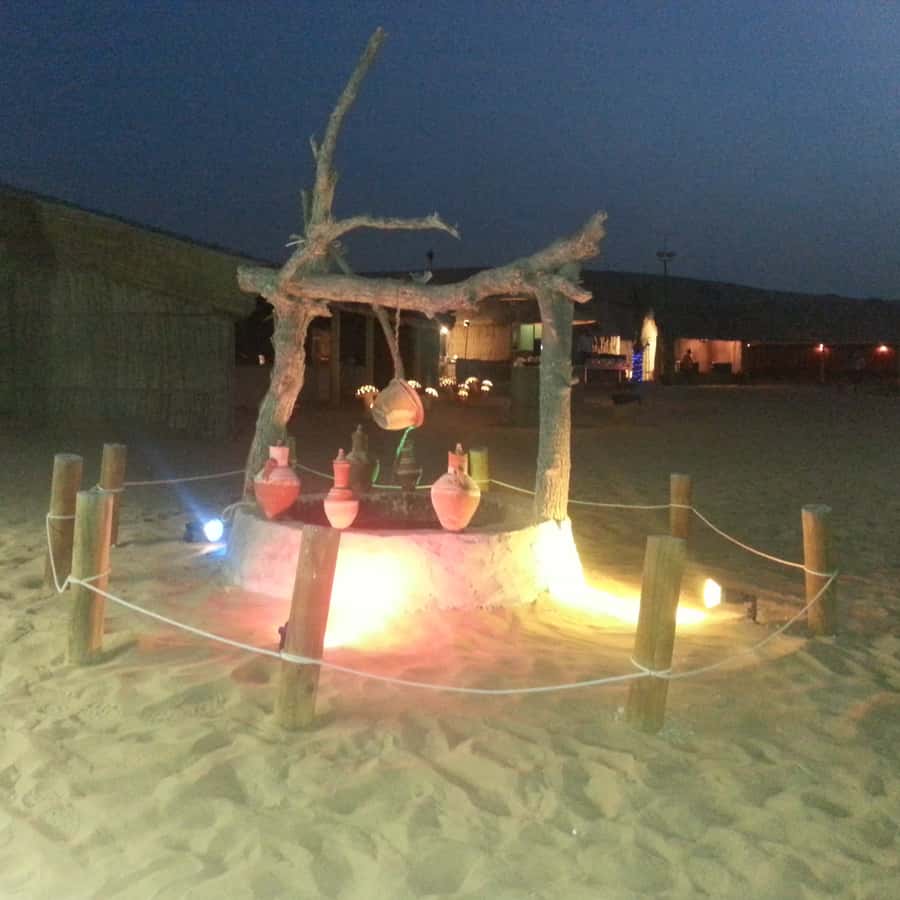 Dubai: Evening Tour with Quad Biking, Camel Ride, and BBQ - Sandboarding on the soft slopes
