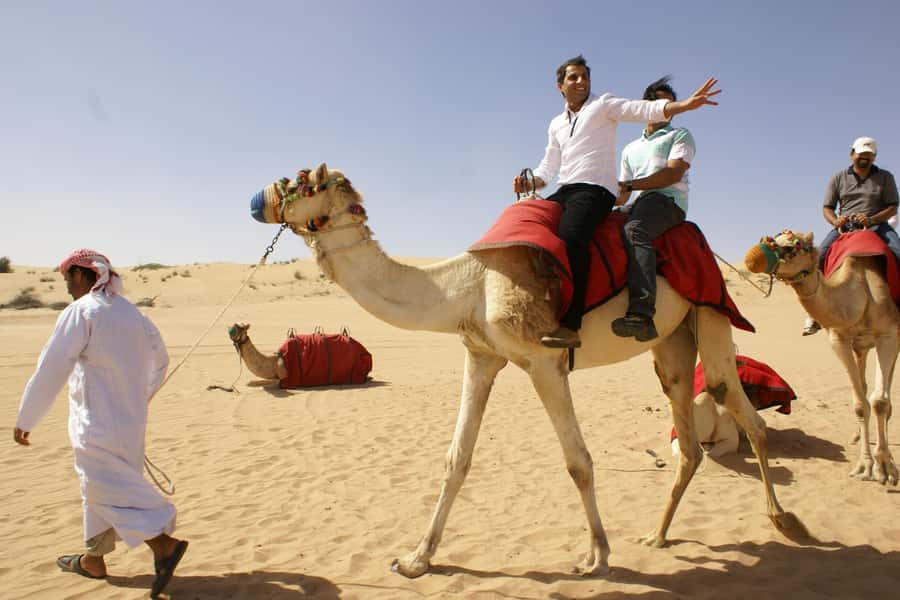 Dubai: Evening Tour with Quad Biking, Camel Ride, and BBQ - The camel ride is brief but atmospheric