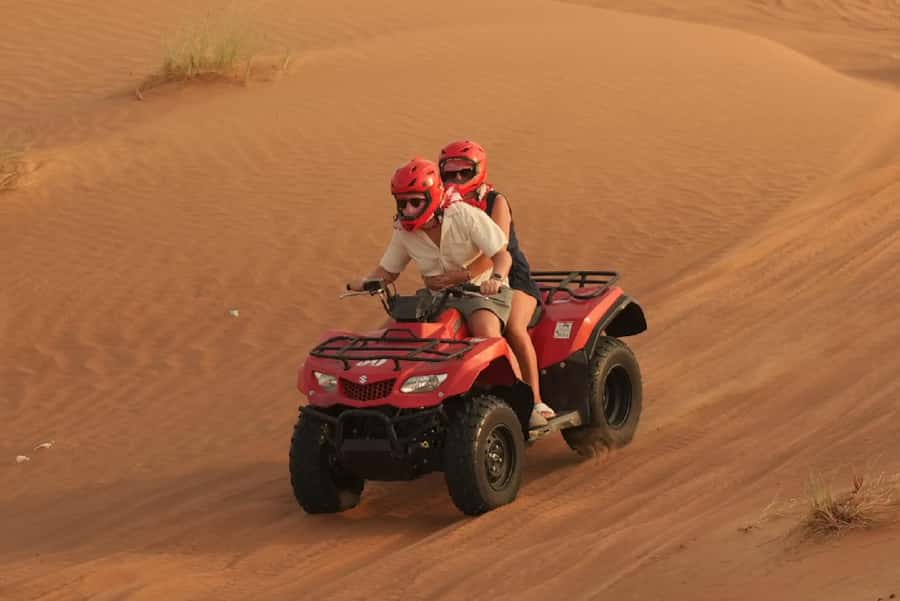 Dubai: Experience 60 Minutes Quad bike & BBQ Dinner - Sunset views, photos, and the camel stop