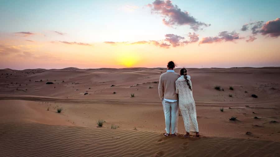 Dubai Fort Lisaili Desert: Quad, Buggy Ride & Free Souvenir - Watching the sunset from the high dunes