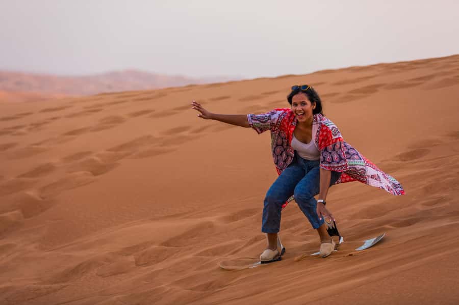Dubai: Half-Day Desert Safari, Camel Ride, ATV & Dune Buggy - Sandboarding for an easy extra thrill