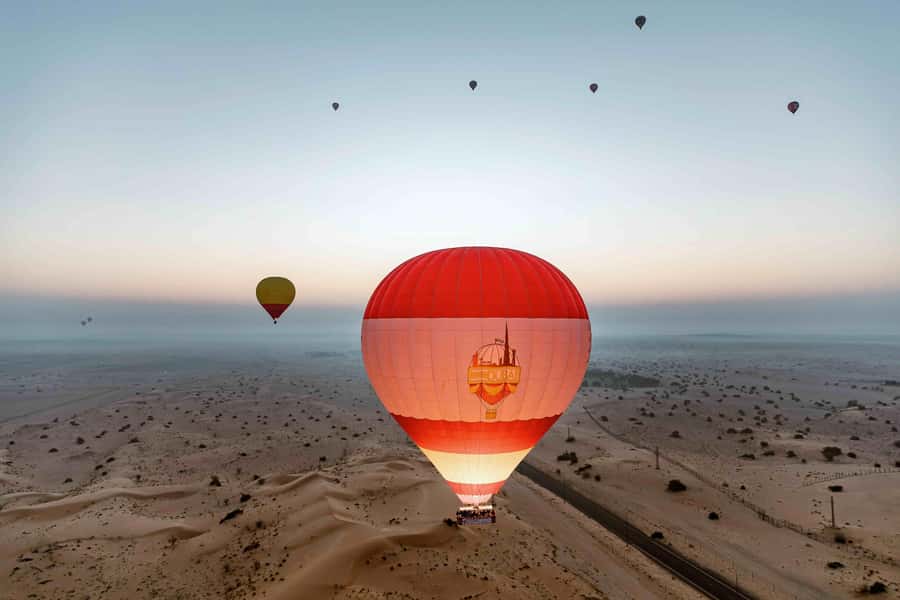 Dubai: Hot Air Balloon, Desert Safari, and Quad Biking Tour - A falcon show with a local connection