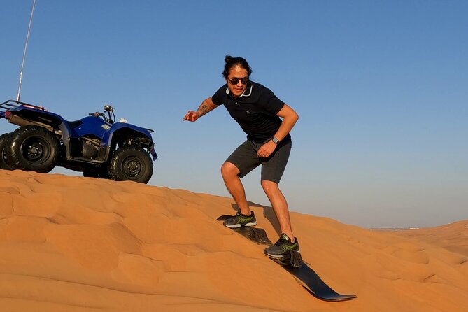 Dubai: Jeep Desert Safari, Camel Ride, and Quad Bike Tour - Quad biking with a proper safety briefing