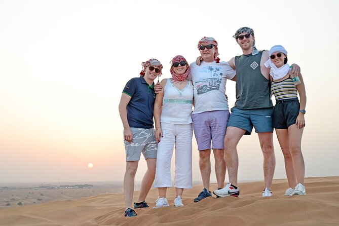 Dubai Morning Desert Safari with Quad Biking & More Activities - Sandboarding on the soft side of the dunes