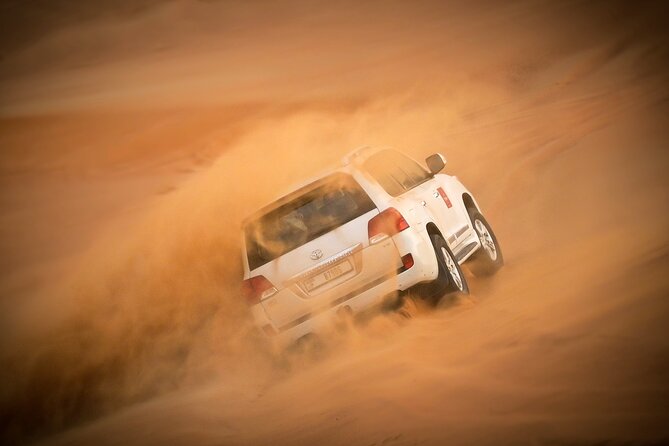 Dubai Morning Desert Safari with Quad Biking & More Activities - A short camel ride, plus optional photo moments