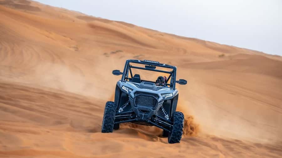 Dubai: Private Dune Buggy, Camel Ride, and Sand Boarding! - Taking the wheel in Dubai’s red desert