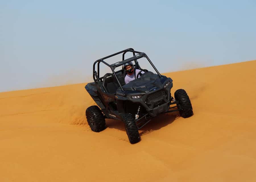 Dubai: Quad Bike, Dune Buggy, and Sandboarding Experience - Photo stops and guides who help with the details