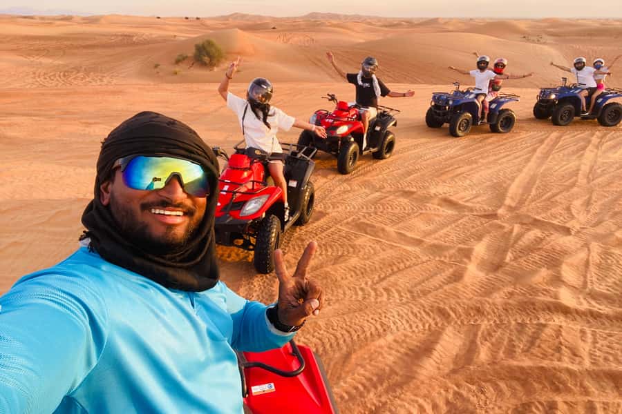 Dubai: Quad Bike Safari, Camels & Al Khayma Camp BBQ Dinner - Sandboarding, dune photos, and a short camel ride