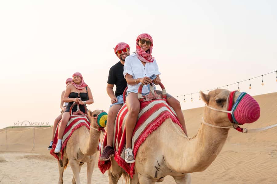 Dubai: Red Dune Desert Safari, Quad Bike, Camels, and BBQ - Red dunes first, city lights later