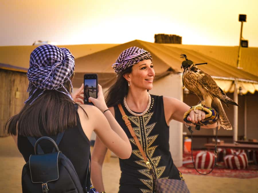 Dubai: Red Dune Desert Safari, Quad Bike, Camels, and BBQ - Sandboarding on steep red dunes