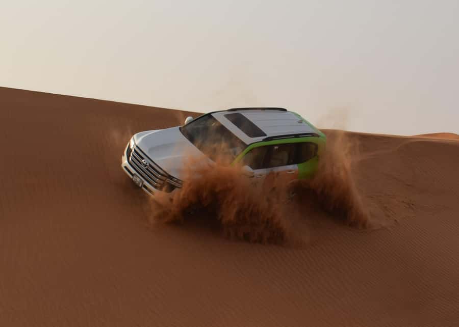 Dubai: Red Dune Safari, Quad Bike, Camel Ride, BBQ Dinner - Leaving Dubai for the red dunes