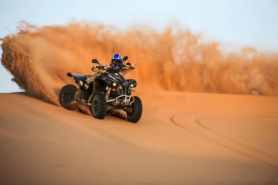 Dubai: Red Dune Safari, Quad Bike, Camel Ride, BBQ Dinner - Quad biking across Lahbab