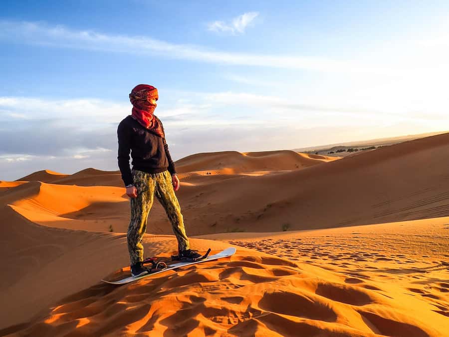 Dubai: Red Dune Safari, Quad Bike, Camel Ride, BBQ Dinner - Sandboarding and sunset photos