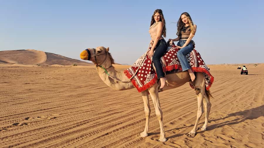 Dubai: Red Dunes Evening Quad Bike, Dune Blast with BBQ - Safety briefing, camel ride, and quad biking