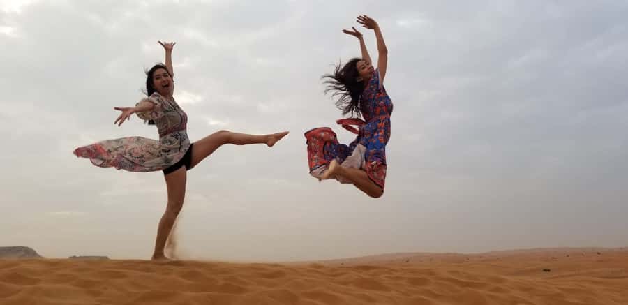 Dubai: Red Dunes Evening Quad Bike, Dune Blast with BBQ - Belly dancing, Tanura, Arabic music, and fire