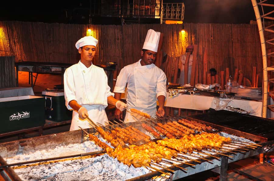 Dubai: Safari, Quad Bike, Camel Ride, and Buffet Dinner - The desert base camp and the quad bike choice