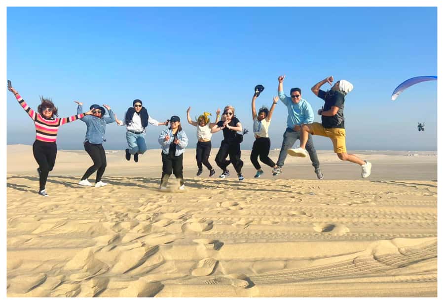 Dune Bashing, Sandboarding, Camel Ride & Optional ATV Ride - The ride south in an air-conditioned 4x4