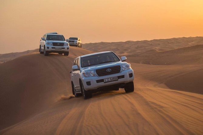 Evening Desert Adventure: Quad Biking, Sandboarding & Camel Ride - BBQ dinner with vegetarian choices