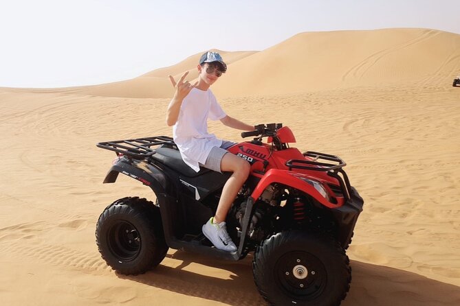 Extreme Quad Driving Adventure Tour - Sandboarding and Camel Riding Add Variety