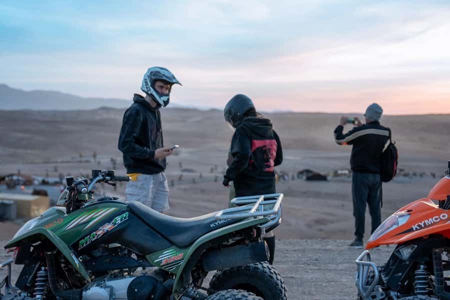 From Marrakech: Agafay Desert Quad Biking with Dinner & Show - Music, campfire, and the fire show