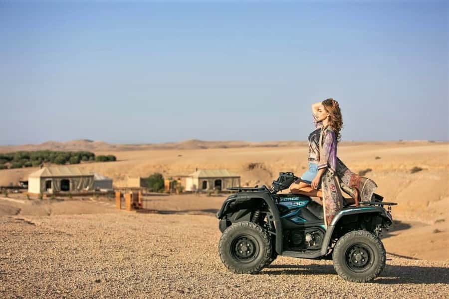 From Marrakech: Agafay Desert Sunset, Quad Biking, & Dinner - Moroccan dinner in a candlelit hut