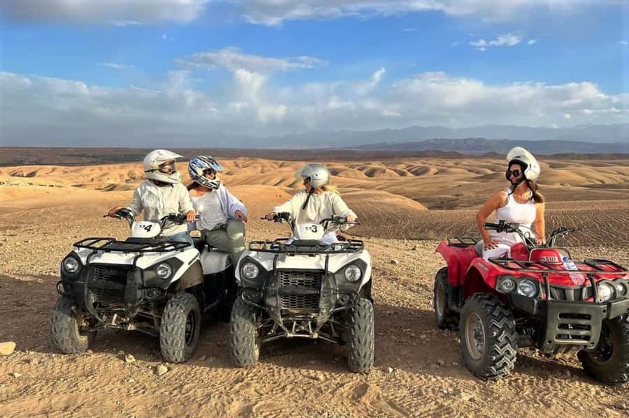 From Marrakech: Agafay Desert Sunset, Quad Biking, & Dinner - Ahwach music, campfire, and fire performers