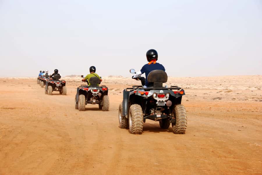 From Marrakesh: Agafay Desert Quad Biking, Camels & Dinner - Leaving Marrakech for Agafay’s stony open plains