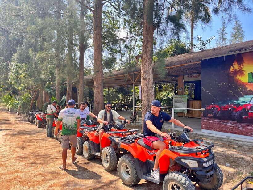 From Phuket: ATV Scenic Routes with Karon and Patong Views - Palm plantations, slopes, and uneven trail