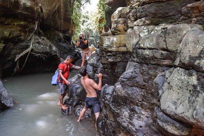 Full-Day Private Bali Jungle Rush Tour: Canyoning & ATV Adventure - A canyon start with real hands-on action