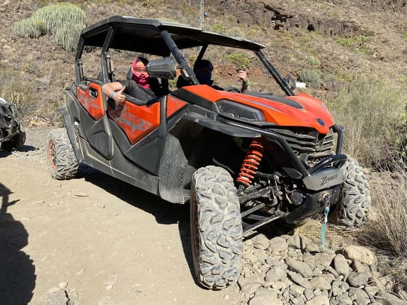GRAN CANARIA: FAMILY MONSTER BUGGY <em>4 SEATS -LONG TOUR 2.5HR – A family buggy built for shared adventure’ /></p>
<p><p>This is not a quiet ride through the countryside. It is a family-sized off-road outing in a four-seat buggy, designed so parents and children can ride together rather than split into separate vehicles.</p>
</p>
<p><p>The route begins around Maspalomas and heads inland toward Fataga. You can expect a mixture of road travel and rougher mountain tracks, with dust, jolts, bends, and changing views. The point is not to reach one famous monument. The pleasure comes from handling the buggy and watching the resort coast give way to the dry mountain country of Gran Canaria.</p>
</p>
<p><p>For families, the seating arrangement matters. A four-seat vehicle keeps the group together and makes the price easier to assess than an activity requiring one buggy per adult. You can also switch drivers during the outing at no extra cost. That makes sense if two adults want a turn, or if one driver would rather relax for part of the route.</p>
</p>
<p><p>You need a valid driving license, and drivers must have at least one year of driving experience. Drivers must also be at least 21 years old. The operator lists a maximum weight of 140 kilograms per person.</p>
</p>
<h2>From Maspalomas toward Fataga</h2>
<p><img width="800" height="600" decoding="async" src=