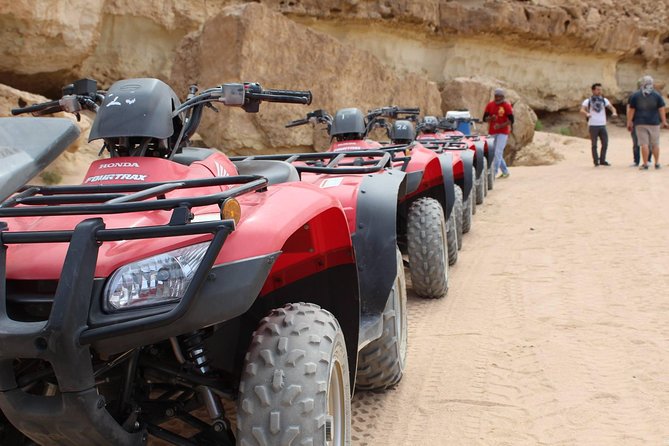 Hurghada: ATV Quad Safari& Bedouin Village Tour - Riding an ATV through the Hurghada desert