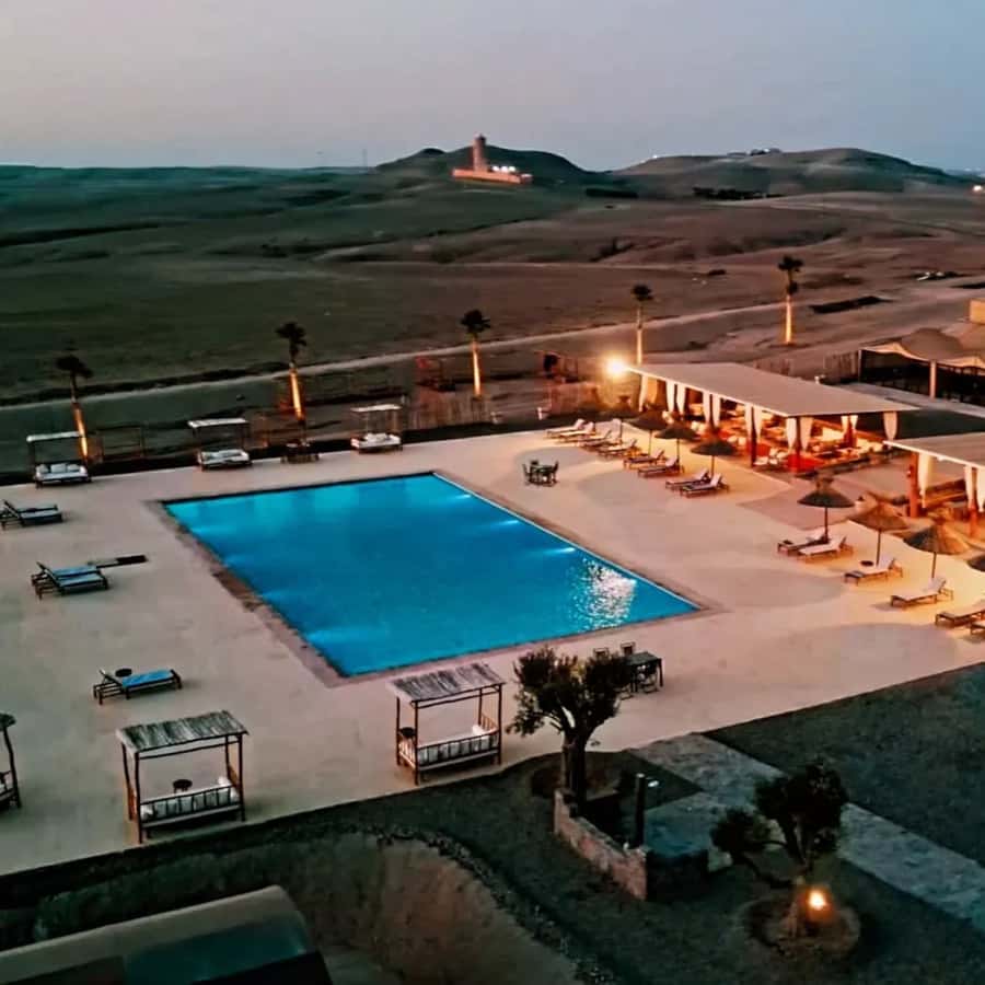Luxury Agafay Desert : Quad , Camel Ride, Pool & Dinner Show - Getting there by air-conditioned vehicle