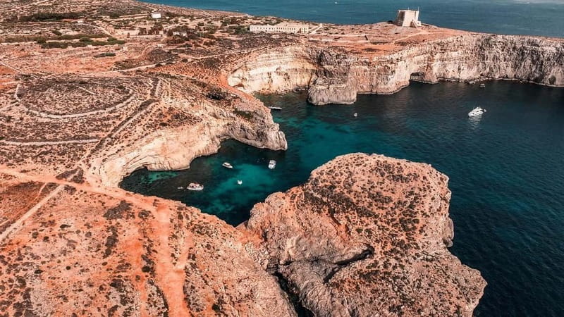 Malta: Blue Lagoon & Sea Caves Boat Trip & Gozo Buggy Tour - Crystal Lagoon: the quieter swim stop