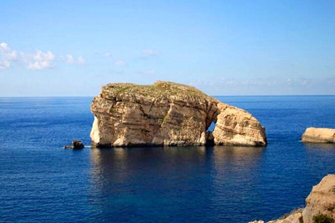 Malta: Gozo Full Day Buggy Tour with lunch and Comino Stop - Wied il-Mielaħ Window and the salt pans