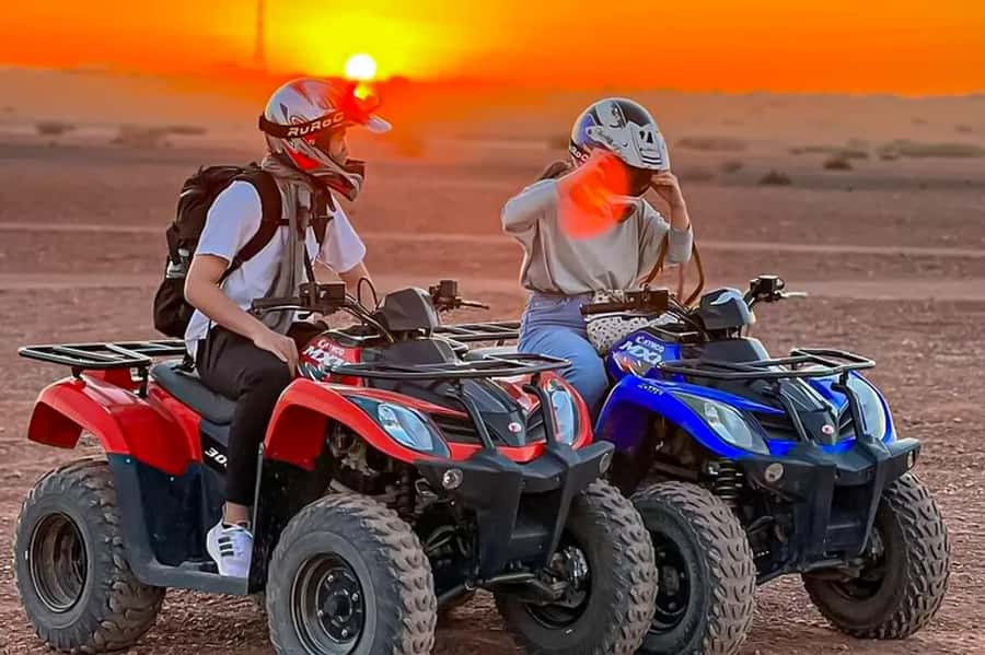 Marrakech: Agafay Desert: Camel ride Quad Bike, Dinner show - Riding a camel at sunset