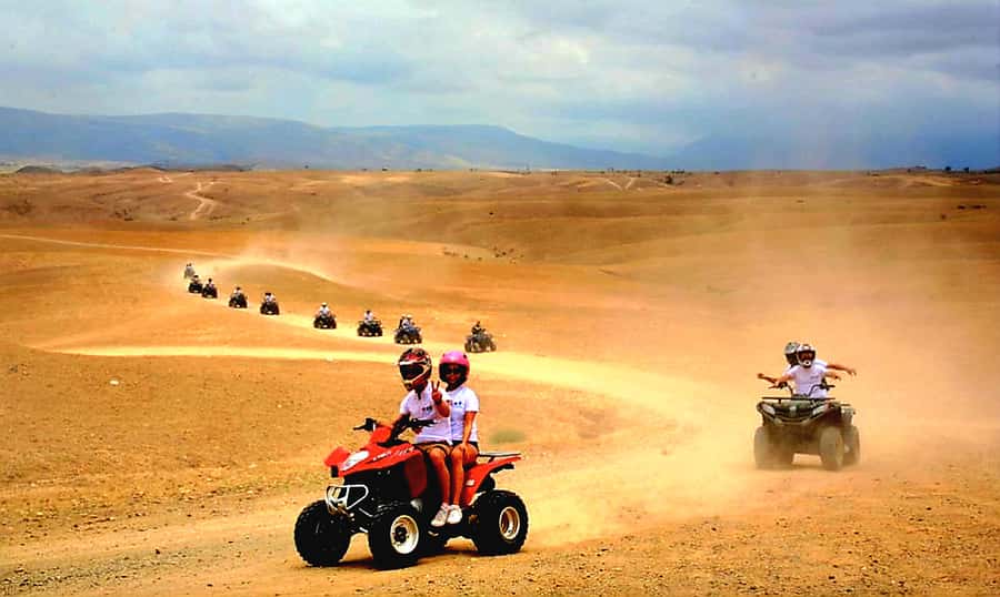 Marrakech: Agafay Desert Dinner Show with Quad Bike & Camel - Quad biking across Agafay’s rocky tracks