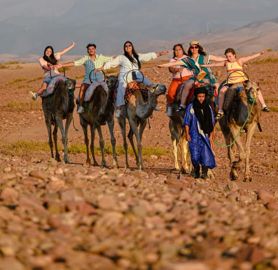 Marrakech: Agafay Desert Quad, Camel Ride & Dinner Show - The quad ride across rocky tracks
