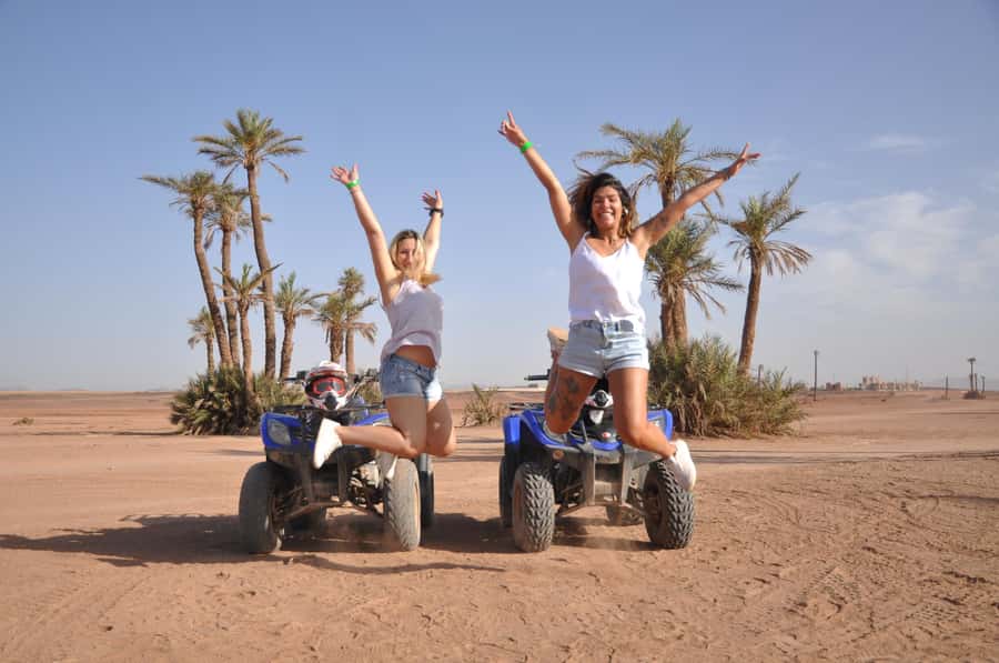 Marrakech: Desert and Palm Grove Quad Tour with Tea - Riding the palm grove and rocky desert