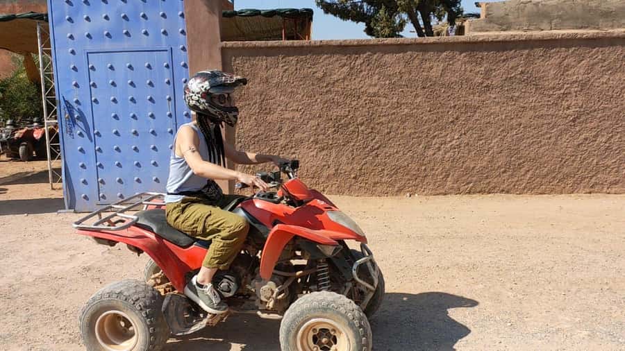 Marrakech Desert & Palm Grove Quad Bike Tour - Riding through palms, sand, and rocky tracks
