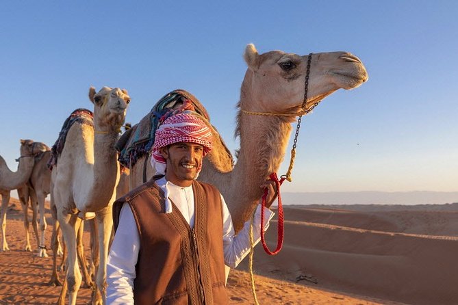 Morning Desert Safari with Quad Bike, Camel Ride & Sandboarding - A short camel ride with a traditional feel