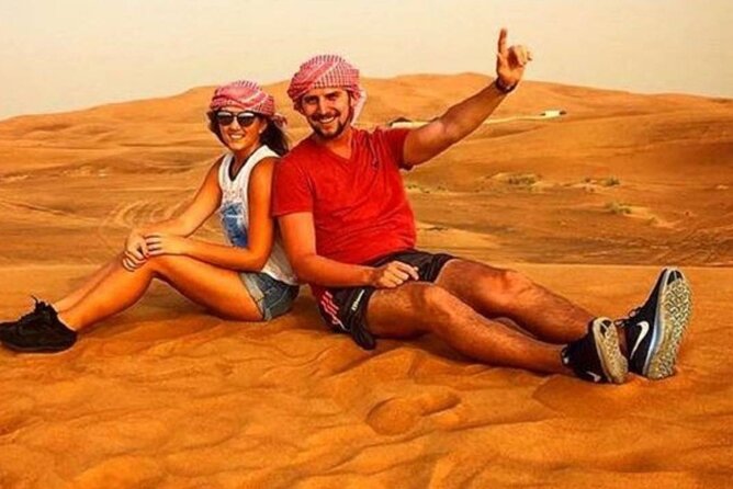 Morning Desert Safari with Quad Bike, Camel Ride & Sandboarding - Sandboarding and desert photo stops