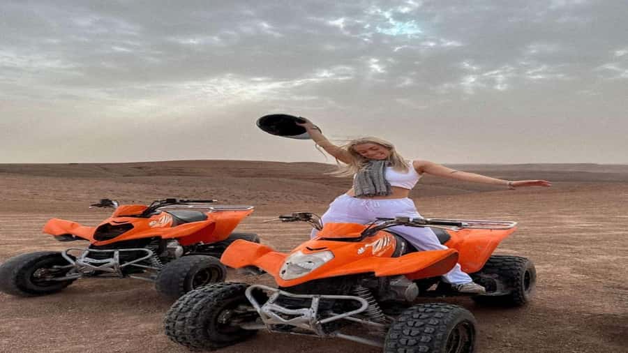 package: Agafay dinner, Sunset, show , Quad or Camel Ride - Sunset, campfire music, and Moroccan dinner