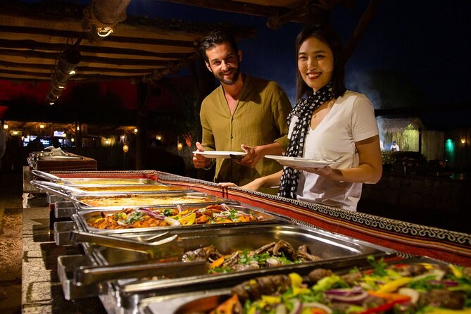 Premium Desert Safari Dubai : Dune Bashing, Camel Ride with BBQ - The camp evening: BBQ, coffee, henna, and shows